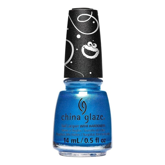 China Glaze blue metallic shimmer nail polish bottle with black cap featuring a character on a white background