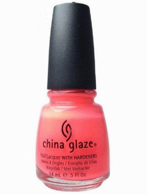 A bottle of China Glaze nail polish in a vivid coral pink color with a white label.