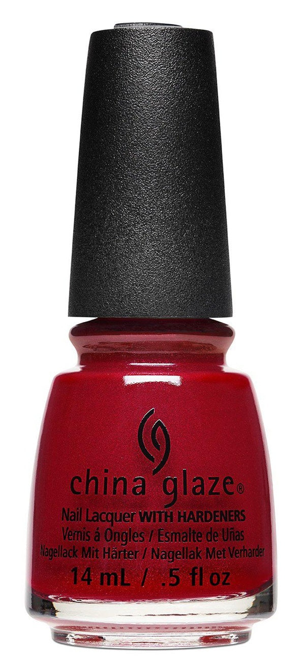 A bottle of China Glaze nail lacquer in a deep red shade, with a black cap and clear glass bottle with printed text on a white background.
