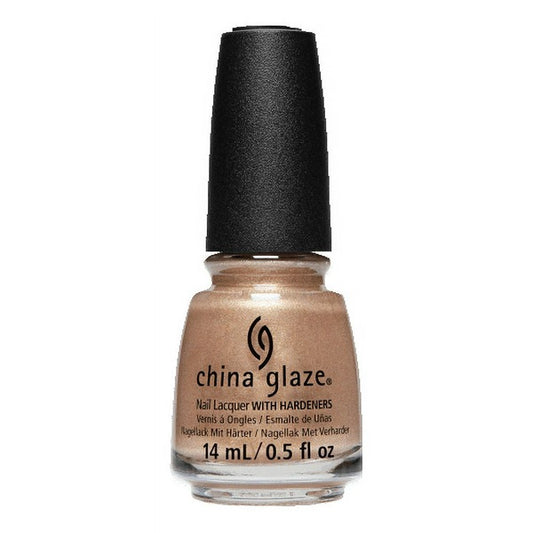 A bottle of China Glaze nail polish in a warm champagne gold shade, featuring a black cap and clear glass bottle on a white background.