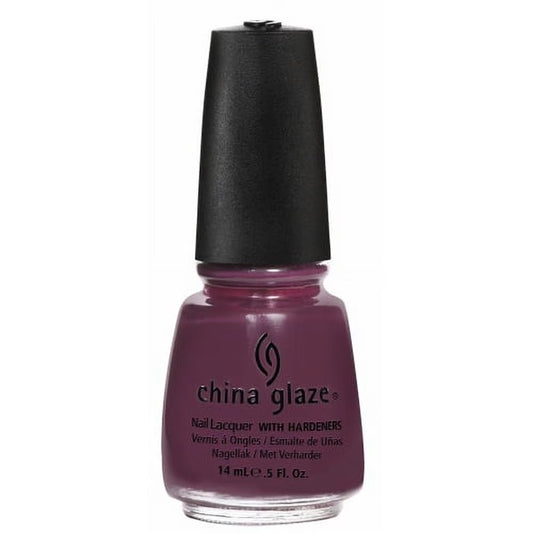 China Glaze plum purple nail polish bottle with black cap on a white background