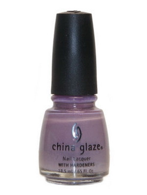 A bottle of China Glaze nail polish in a dusty medium lilac creme color with black cap on white background.