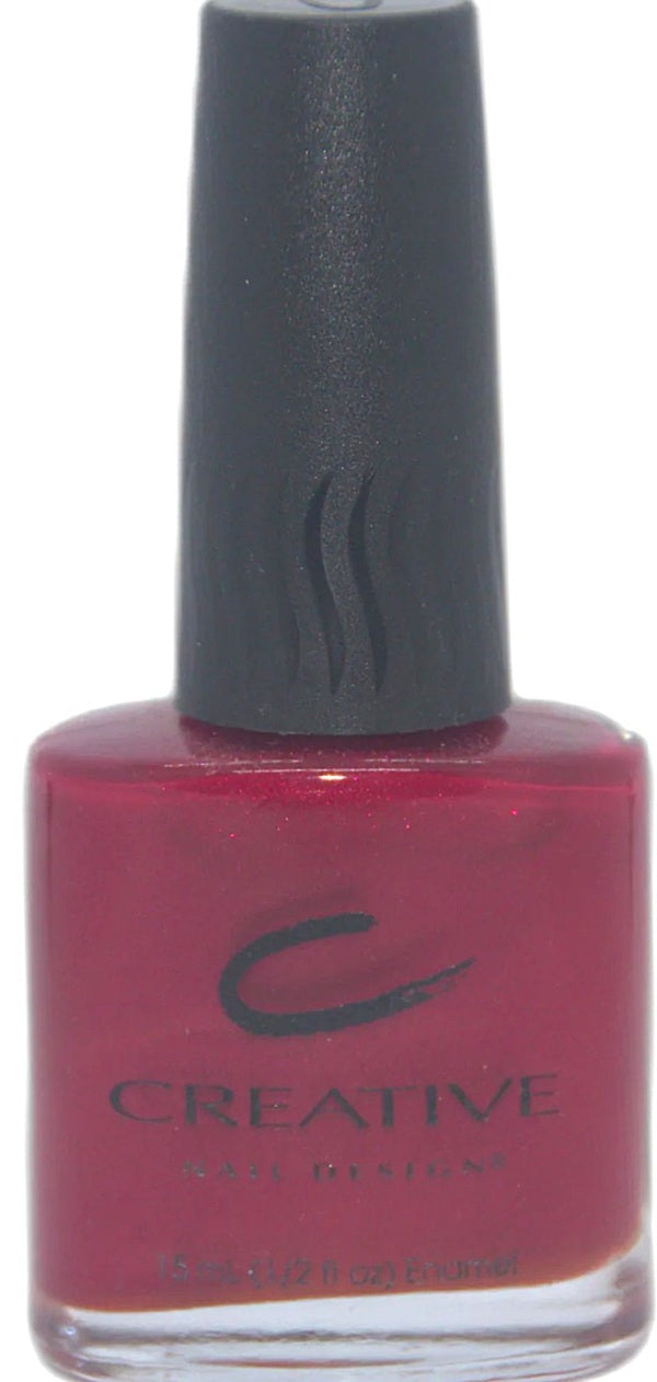 Creative Nail Design red nail polish bottle with black cap on a white background