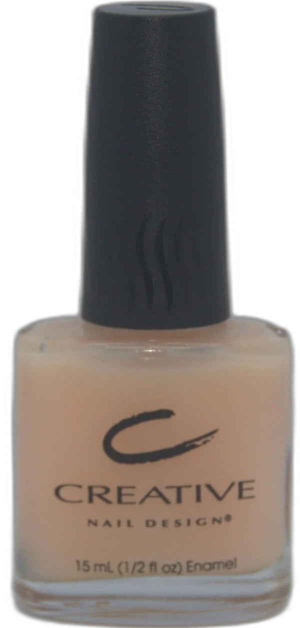 Creative Nail Design nail polish bottle with sheer pink color and black cap on a white background