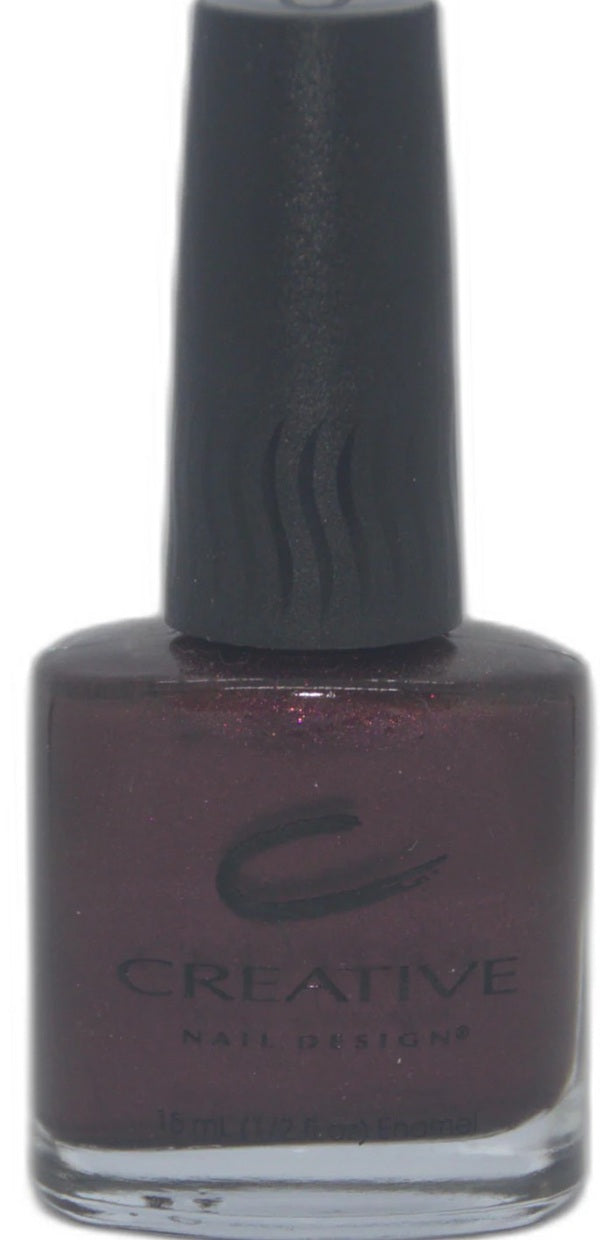 Nail polish bottle with dark purple color and 'Creative Nail Designs' branding on a white background