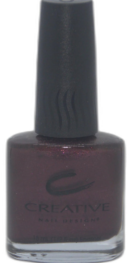 Nail polish bottle with dark purple color and 'Creative Nail Designs' branding on a white background