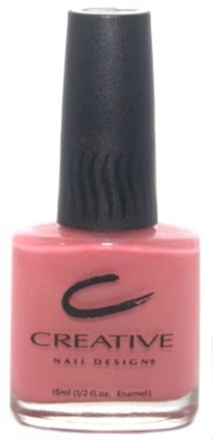 Creative Nail Design pink nail polish bottle with black cap on a white background