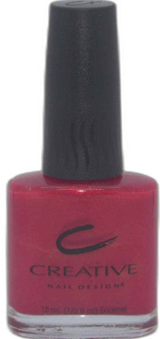 Creative Nail Design red nail polish bottle with black cap on a white background