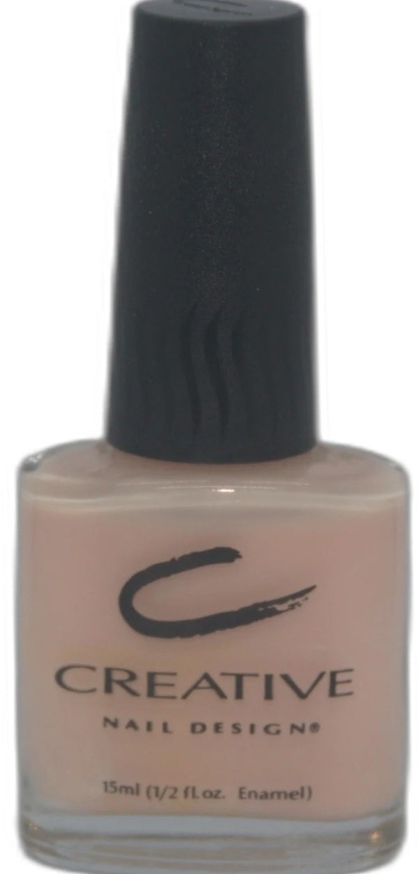Nail polish bottle with 'Creative Nail Designs' branding on a white background