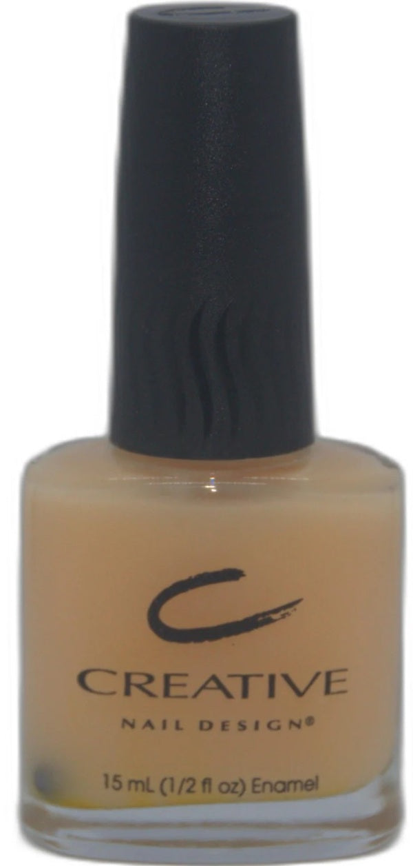 Nail polish bottle with black cap and visible 'Creative Nail Designs' branding on a white background