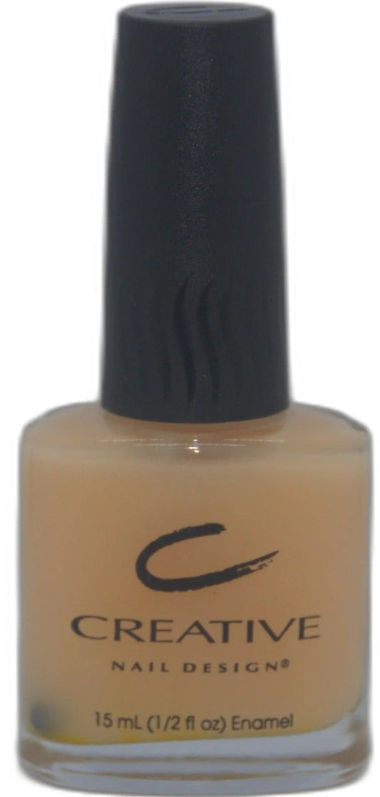Nail polish bottle with black cap and visible 'Creative Nail Designs' branding on a white background
