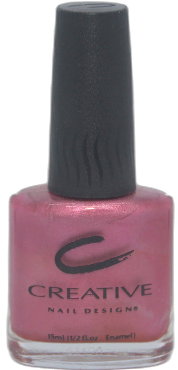 Creative Nail Design pink nail polish bottle with black cap on a white background