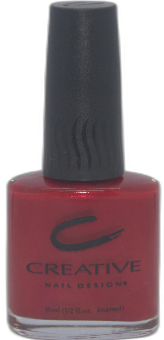 CND red nail polish bottle with black cap on a white background