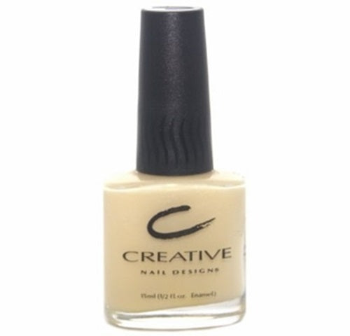 A bottle of Creative Nail Design nail polish in a cream off-white color with a black cap.
