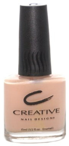 A bottle of Creative Nail Design nail polish in a beige color, with a black cap and a label featuring the brand's logo.