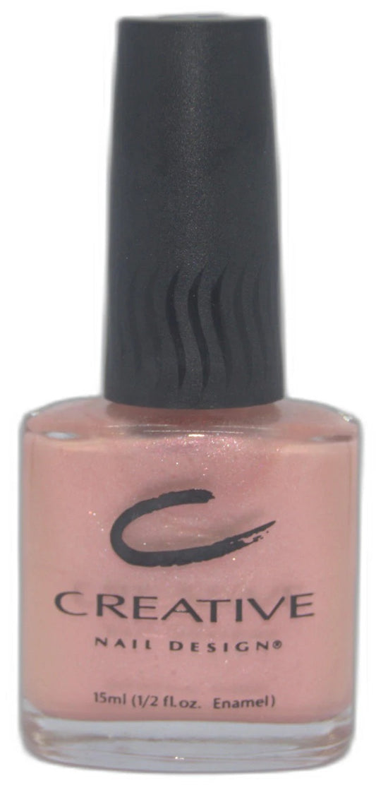 Creative Nail Design nail polish bottle with black cap and pinkish-brown color on a white background.