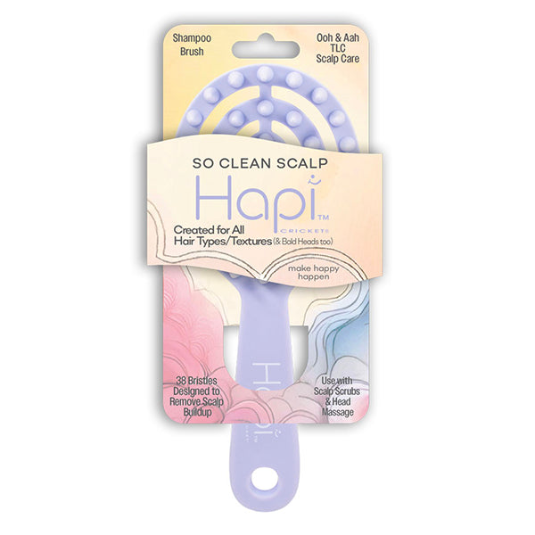 Cricket Hapi scalp care brush with packaging on a white background