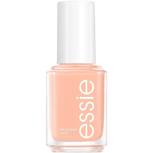 Essie nail polish bottle with peach-colored nail polish on a white background
