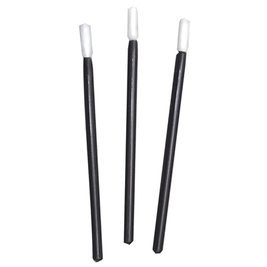 Three black lip gloss applicators with white ends on a white background