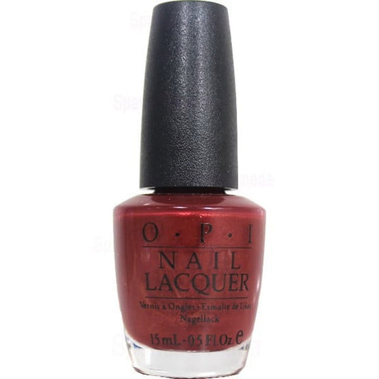 OPI nail lacquer bottle with red polish and black cap on a white background