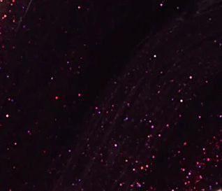 Close-up of a dark red purple nail polish  with shimmer.