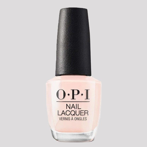 OPI light pink nail polish bottle with black cap on a light gray background