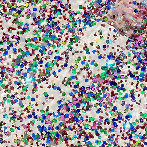 Multicolored small round glitter nail polish swatch on a white background