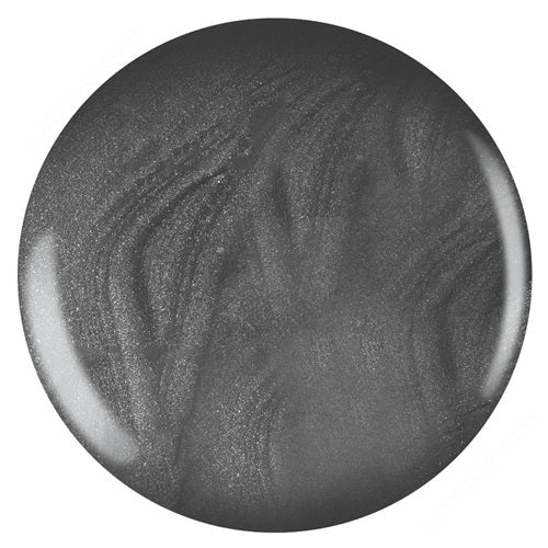 Round gray nail polish swatch with marbled texture on a white background