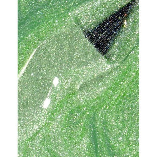 Close-up of a green shimmer nail polish swatch with brush.