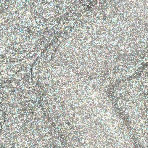 Close-up of a textured silver surface with a glittery finish