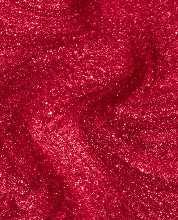 Close-up of a red shimmery nail polish swatch