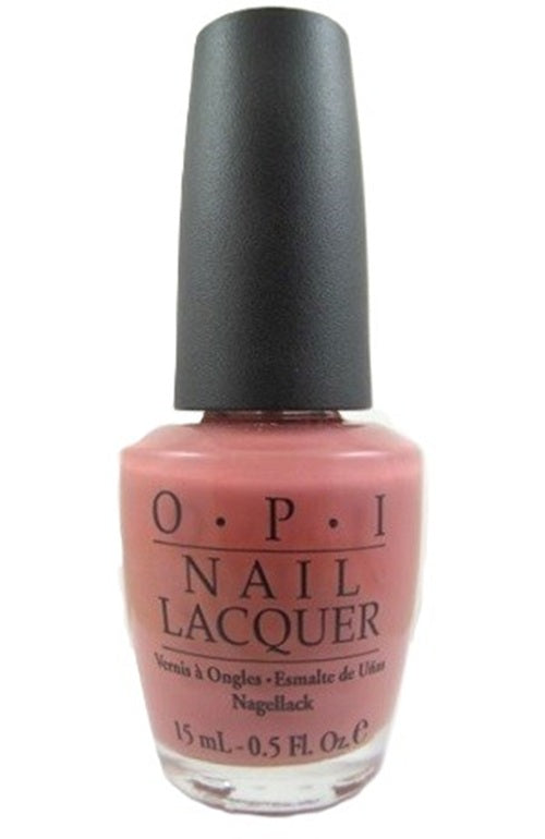 OPI nail lacquer bottle with pink polish and black cap on a white background