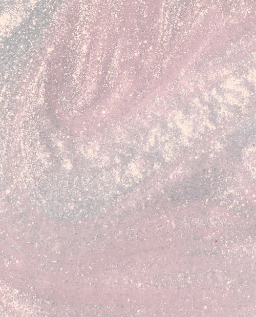 Light pink shimmer nail polish swatch.