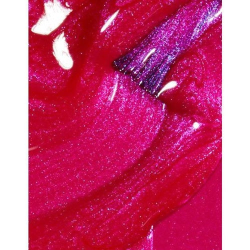 Close-up of a pink nail polish with purple shimmer.i