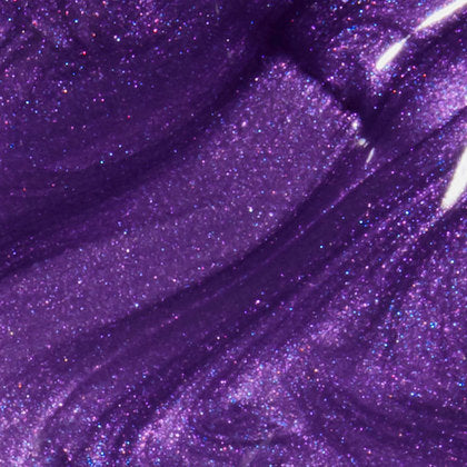 Close-up of purple shimmery nail polish.