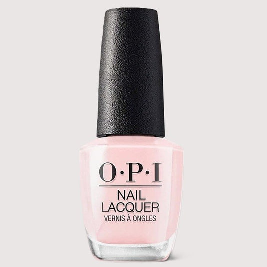 OPI light pink nail polish with black cap.