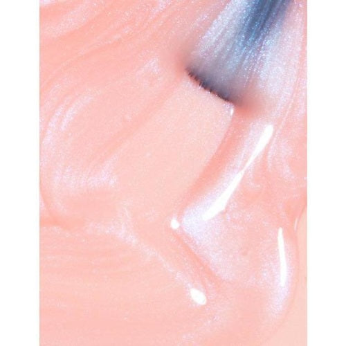 Sheer pink nail polish swatch with brush.