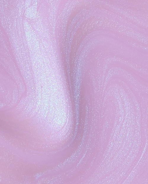 Close-up of lilac pink shimmer nail polish swatch.