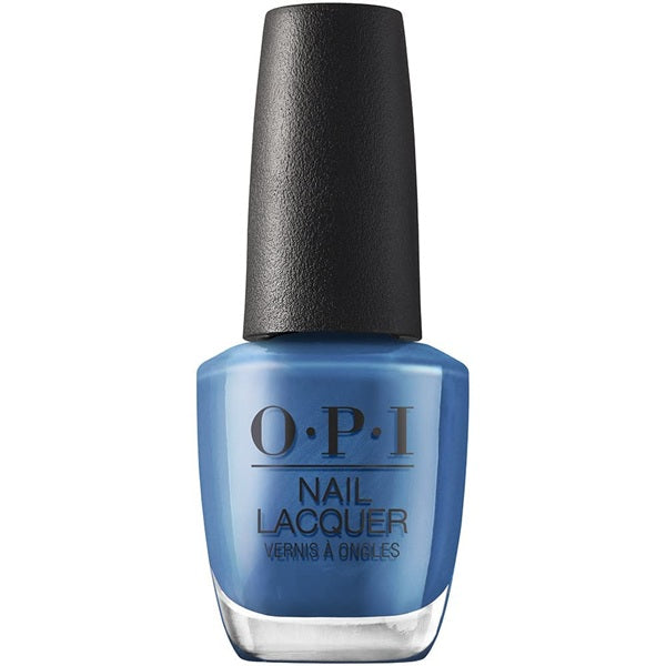 Blue nail polish bottle with black cap on a white background