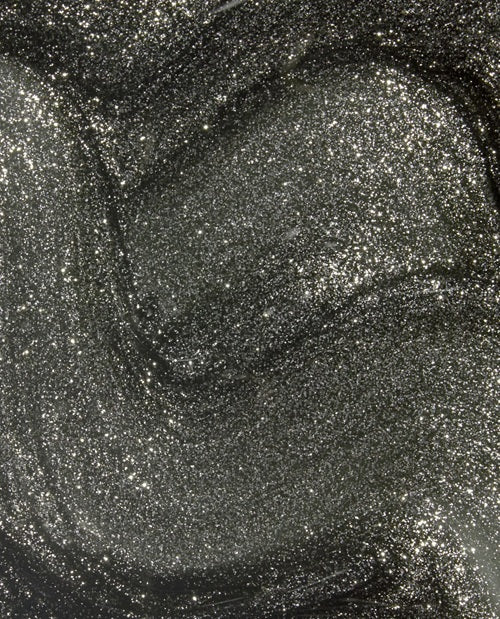Close-up of a gunmetal silver shimmer nail polish swatch.